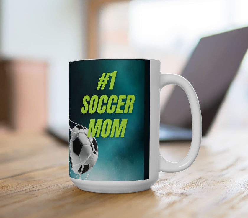 Mug with '#1 Soccer Mom' text and soccer ball design on a teal background
