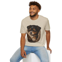 Man wearing a beige t-shirt with a dog graphic on a white background