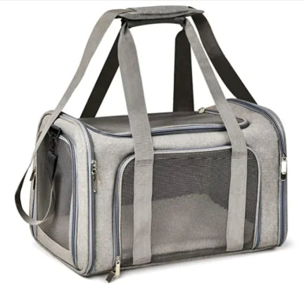 Gray pet carrier with mesh side on a white background