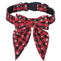 Red, black, and white plaid dog collar with matching bow tie on a white background