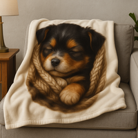 Sleeping puppy on a blanket with a cozy living room setting