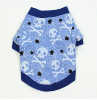 Blue pet shirt with skull and crossbones pattern on a white background