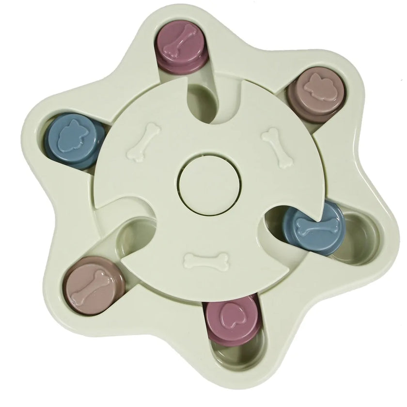 a pastel-colored  puzzle toy - uncover kibble stored beneath the sliders.