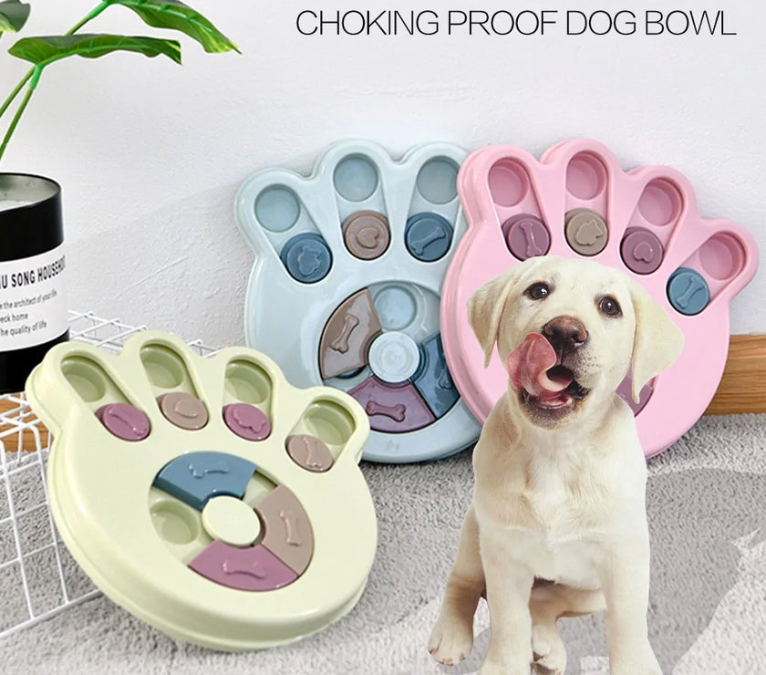 a pastel-colored paw-shaped puzzle toy - uncover kibble stored beneath the sliders.