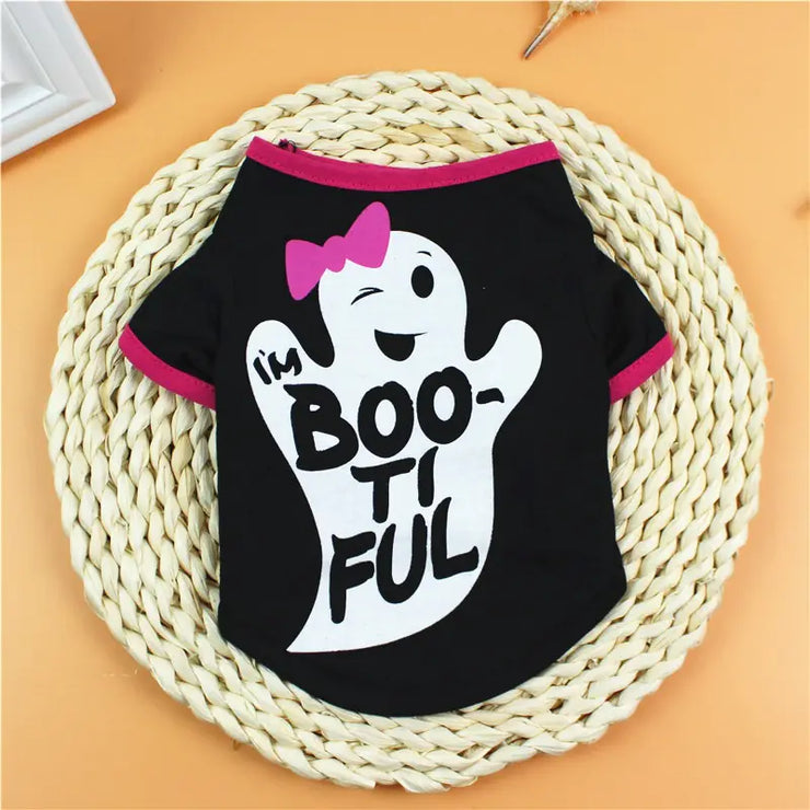 Black pet shirt with ghost design and 'I'm BOO-ti FUL' text on a woven mat.