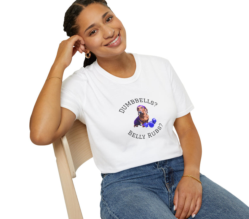 Female wearing white adult T-shirt with a printed image of a dog and the humorous text 'Dumbbells? Belly Rubs?', designed for dog lovers and fitness enthusiasts.