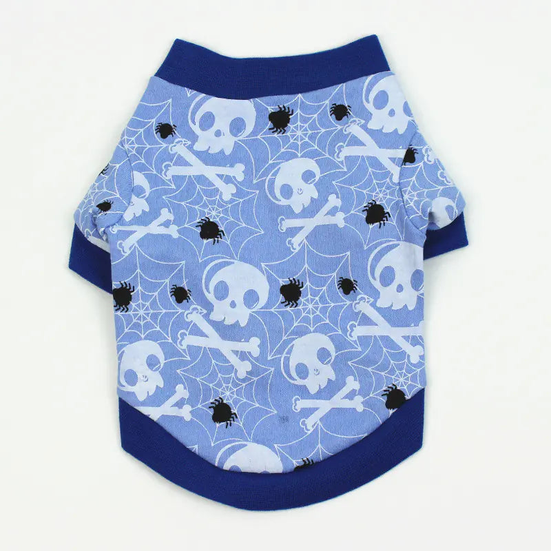 Dog shirt with skull and crossbones pattern on a blue background