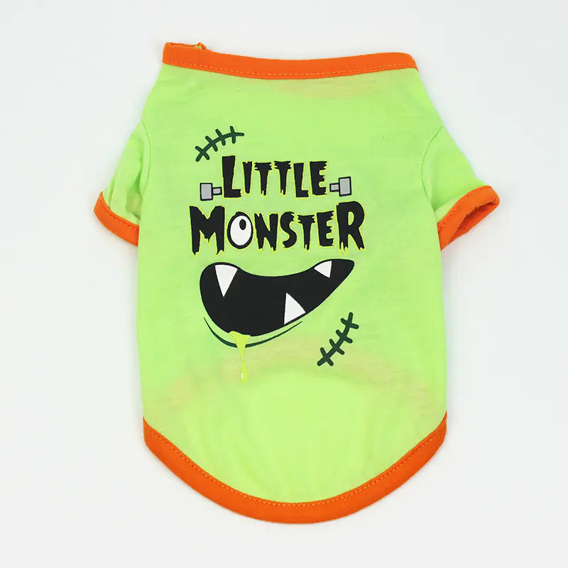 Green pet shirt with 'Little Monster' text and orange trim on a white background