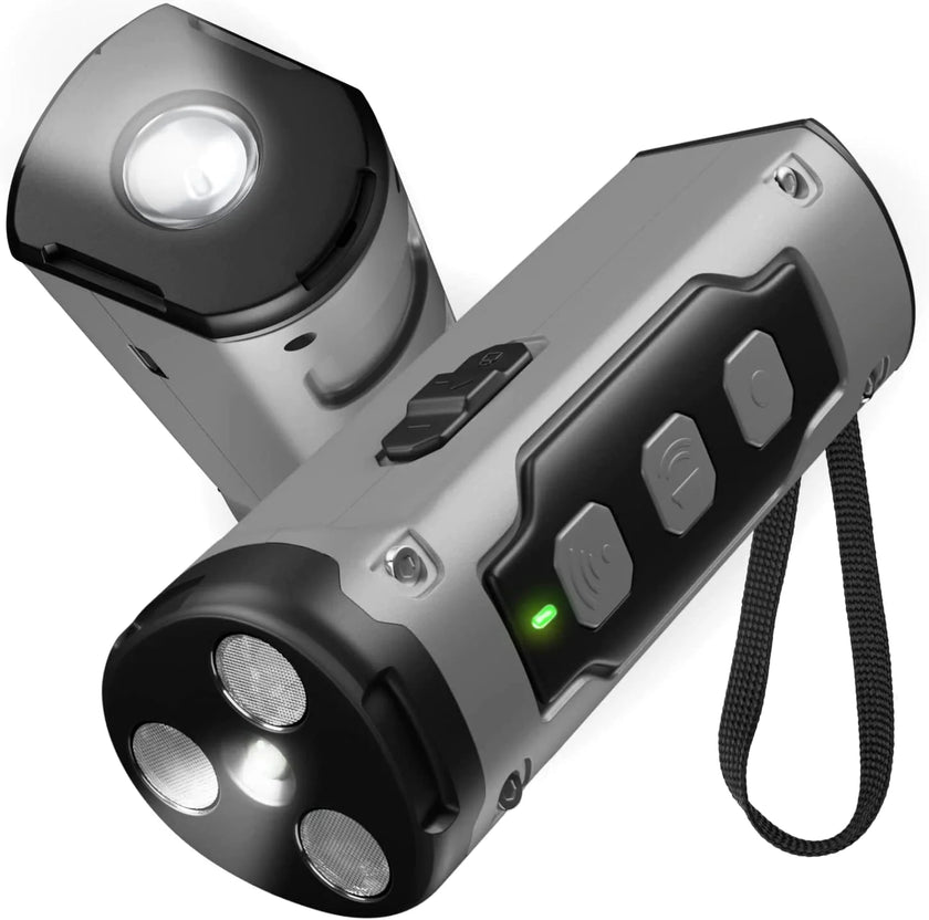 A close-up view of a black handheld ultrasonic dog training device featuring three mesh speaker emitters, control buttons, and an integrated flashlight on top.
