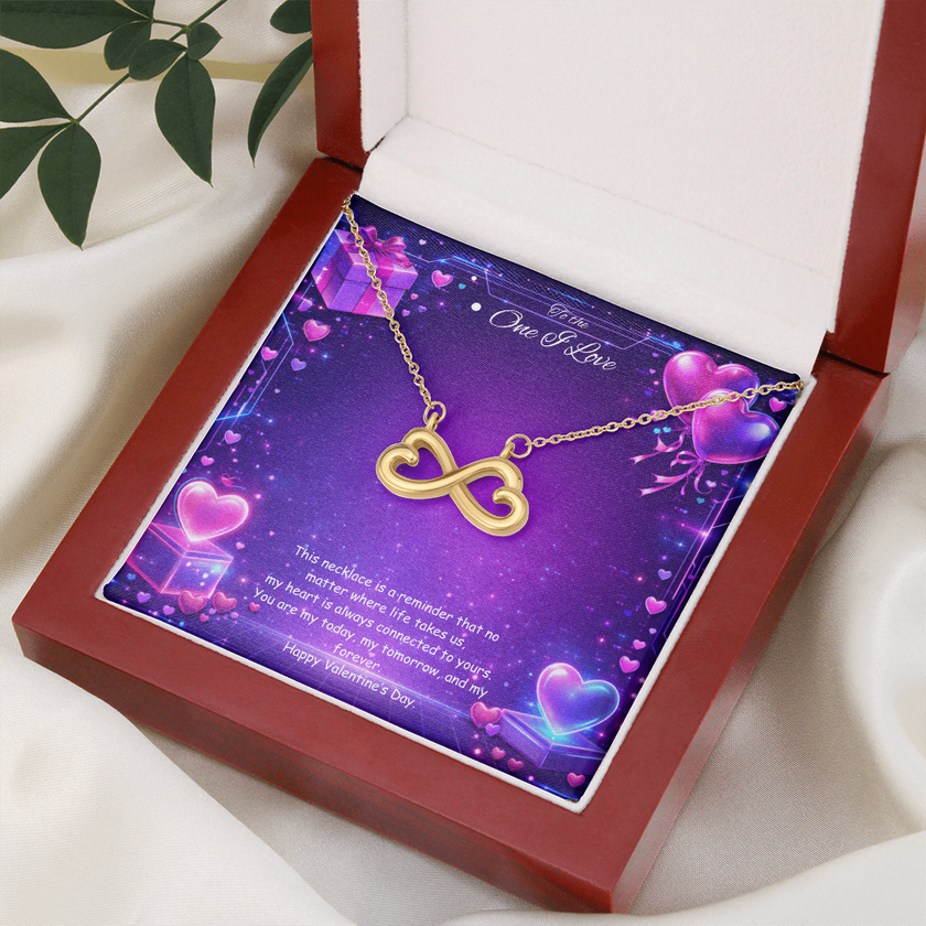 Gold infinity heart necklace displayed in a gift box on a purple Valentine-themed background symbolizing endless love.