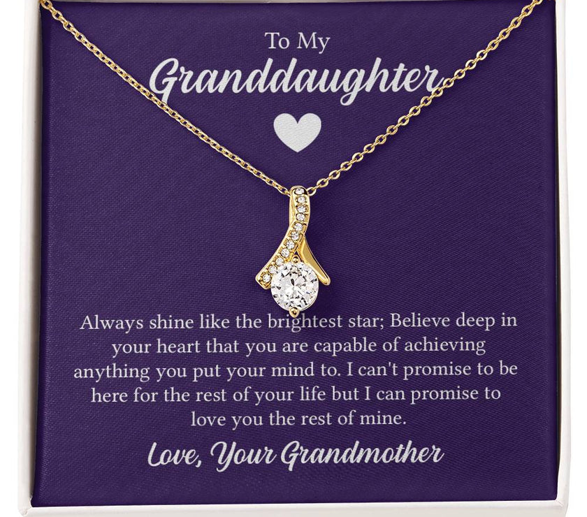 Alluring Beauty necklace features a petite ribbon shaped pendant with message card To My Granddaughter