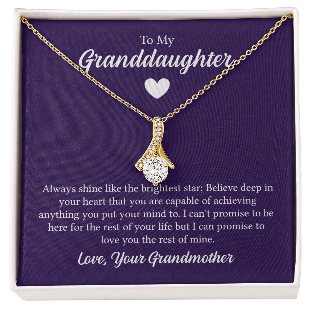 Alluring Beauty necklace features a petite ribbon shaped pendant with message card To My Granddaughter