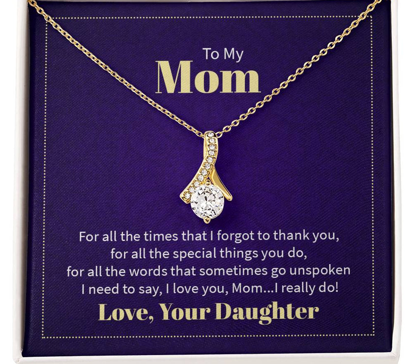 Alluring Beauty necklace features a petite ribbon shaped pendant with message card To Mom  18k Yellow Gold Finish