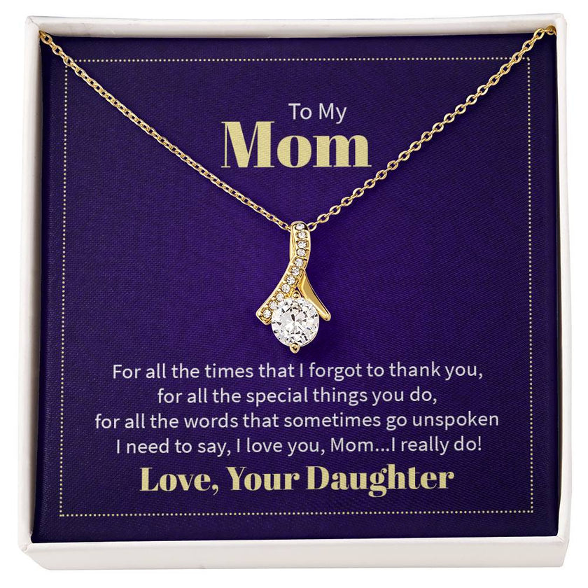 Alluring Beauty necklace features a petite ribbon shaped pendant with message card To Mom  18k Yellow Gold Finish