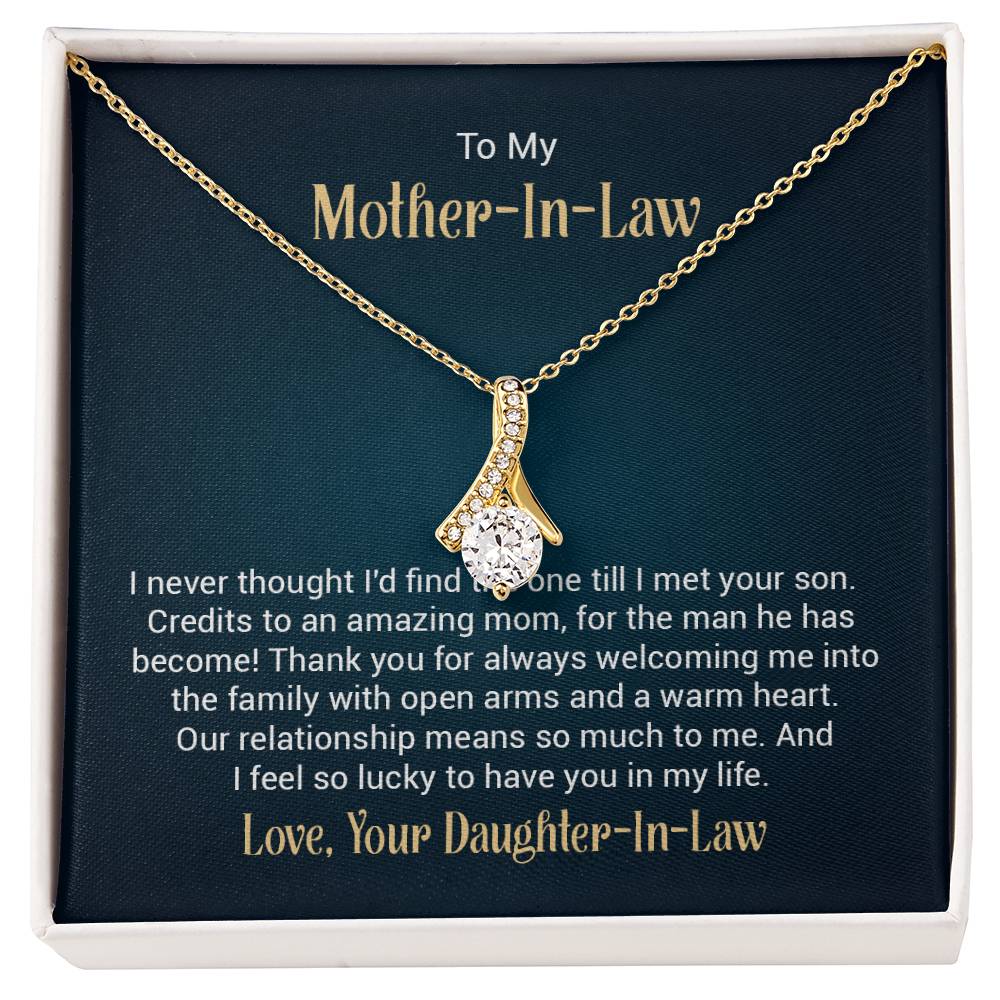 Alluring Beauty necklace features a petite ribbon shaped pendant with message card To My  Mother-In-Law