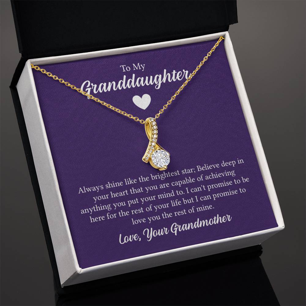 Alluring Beauty necklace features a petite ribbon shaped pendant with message card To My Granddaughter