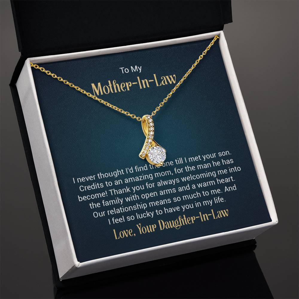 Alluring Beauty necklace features a petite ribbon shaped pendant with message card To My  Mother-In-Law