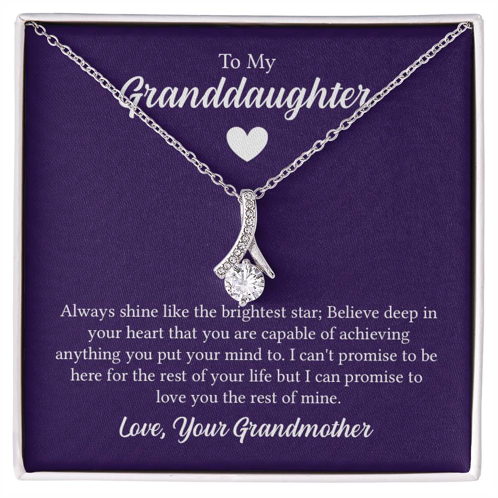 Alluring Beauty necklace features a petite ribbon shaped pendant with message card To My Granddaughter