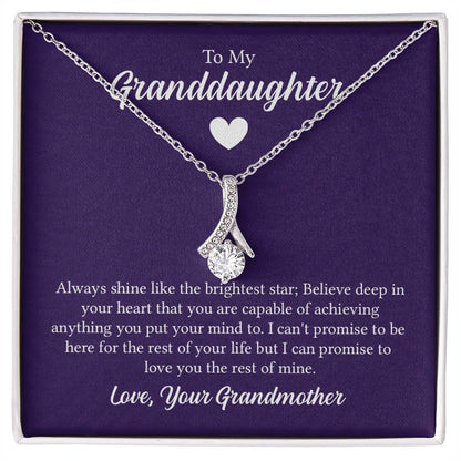 Alluring Beauty necklace features a petite ribbon shaped pendant with message card To My Granddaughter