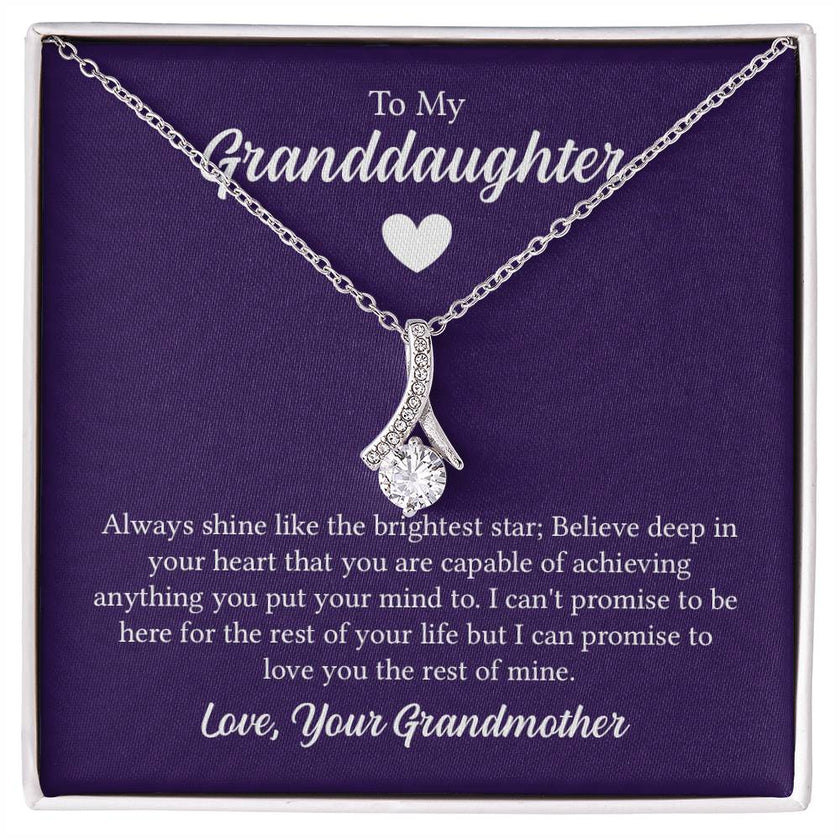 Alluring Beauty necklace features a petite ribbon shaped pendant with message card To My Granddaughter
