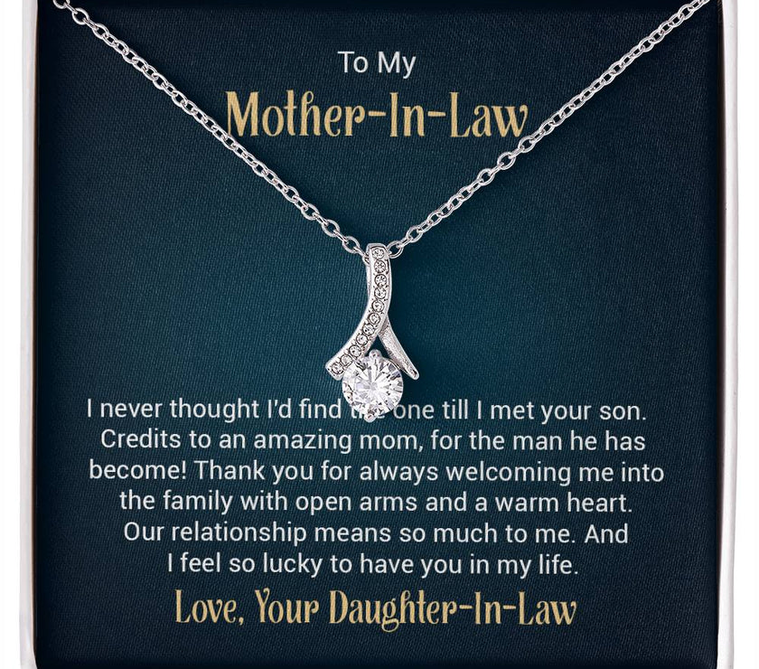Alluring Beauty necklace features a petite ribbon shaped pendant with message card To My  Mother-In-Law