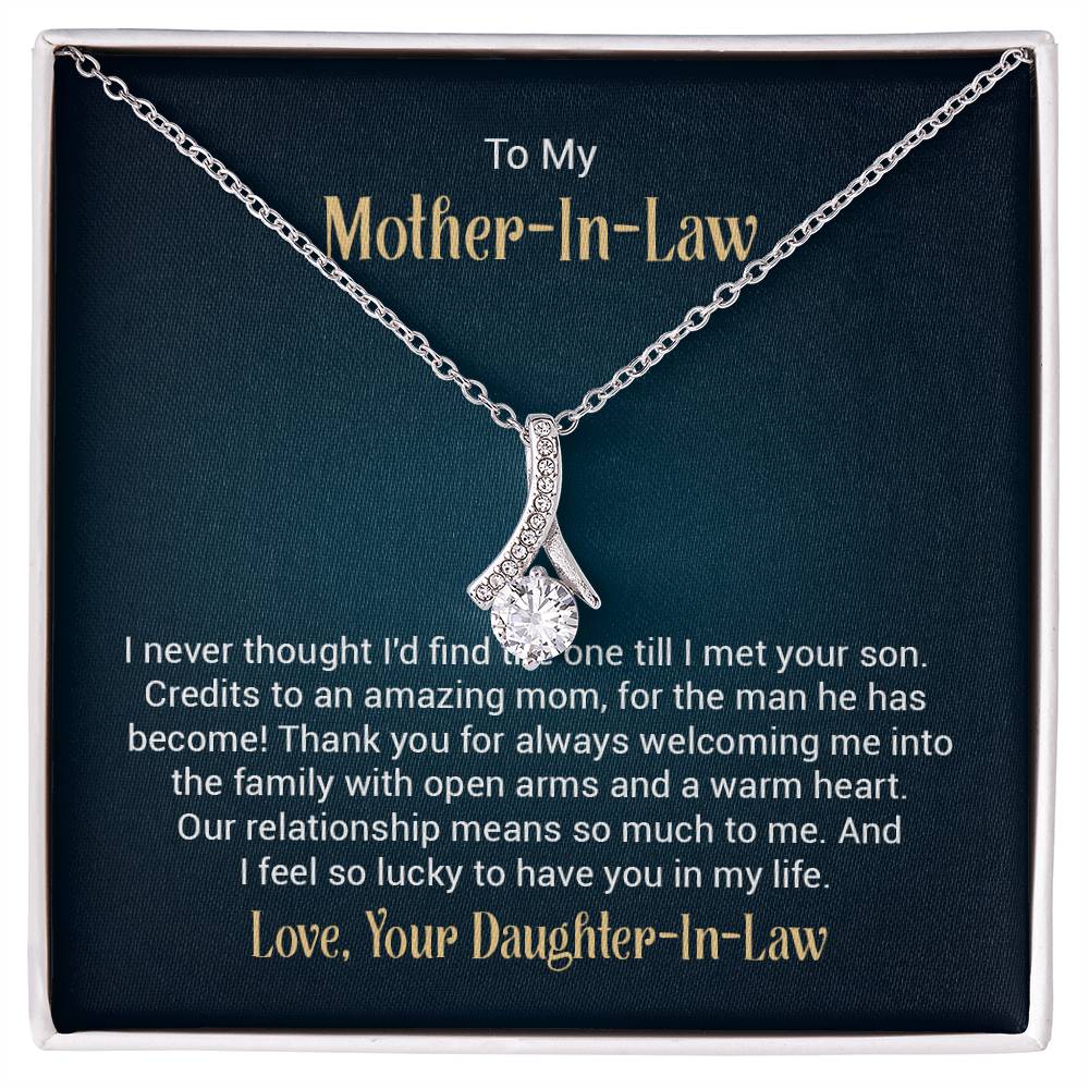 Alluring Beauty necklace features a petite ribbon shaped pendant with message card To My  Mother-In-Law