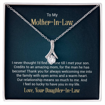 Alluring Beauty necklace features a petite ribbon shaped pendant with message card To My  Mother-In-Law