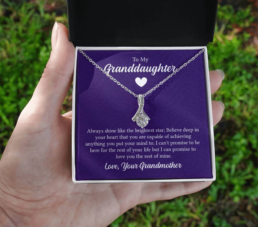 Alluring Beauty necklace features a petite ribbon shaped pendant with message card To My Granddaughter