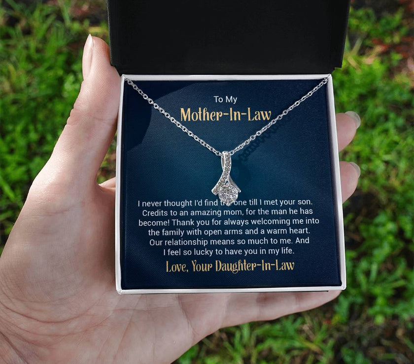Alluring Beauty necklace features a petite ribbon shaped pendant with message card To My  Mother-In-Law