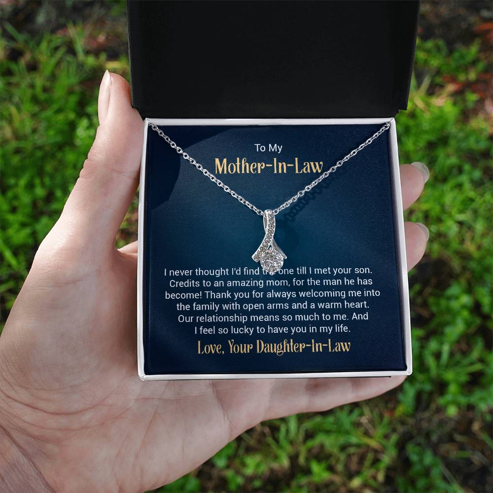 Alluring Beauty necklace features a petite ribbon shaped pendant with message card To My  Mother-In-Law