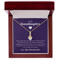 Alluring Beauty necklace features a petite ribbon shaped pendant with message card To My Granddaughter