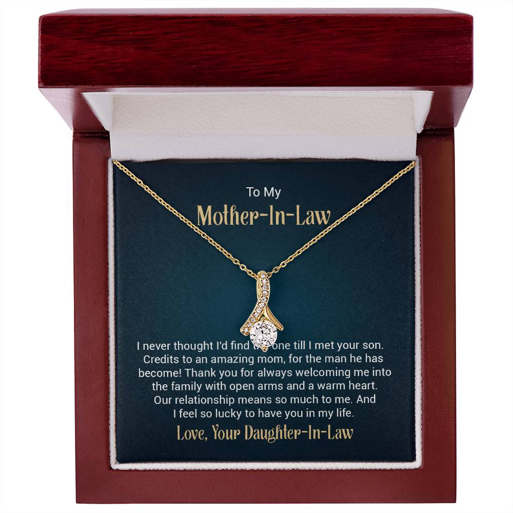 Alluring Beauty necklace features a petite ribbon shaped pendant with message card To My  Mother-In-Law