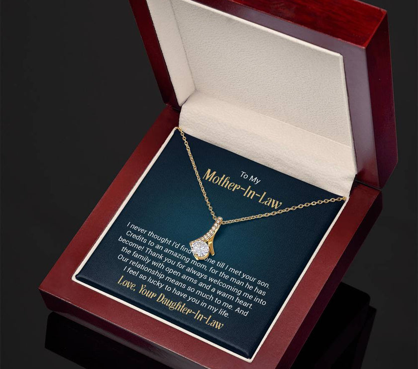 Alluring Beauty necklace features a petite ribbon shaped pendant with message card To My  Mother-In-Law