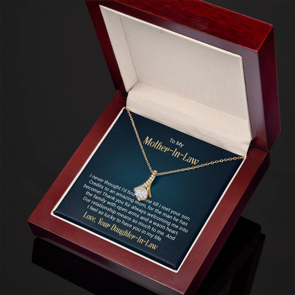 Alluring Beauty necklace features a petite ribbon shaped pendant with message card To My  Mother-In-Law