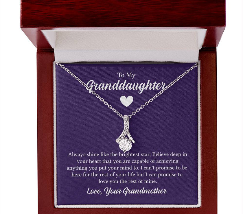 Alluring Beauty necklace features a petite ribbon shaped pendant with message card To My Granddaughter