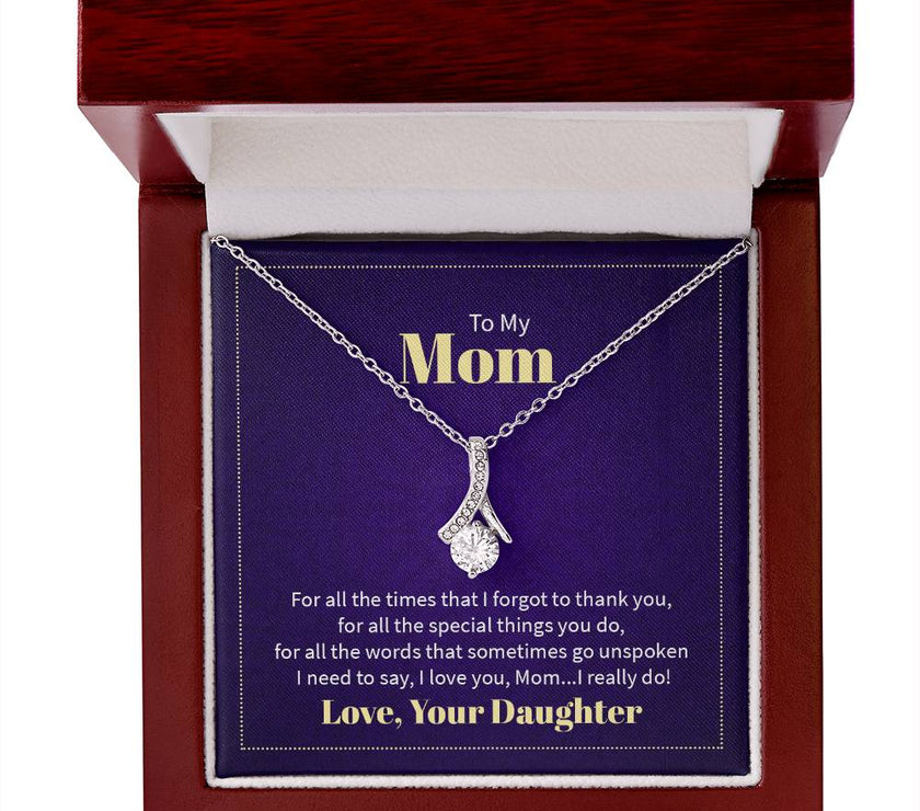 Alluring Beauty necklace features a petite ribbon shaped pendant with message card To Mom white gold finish