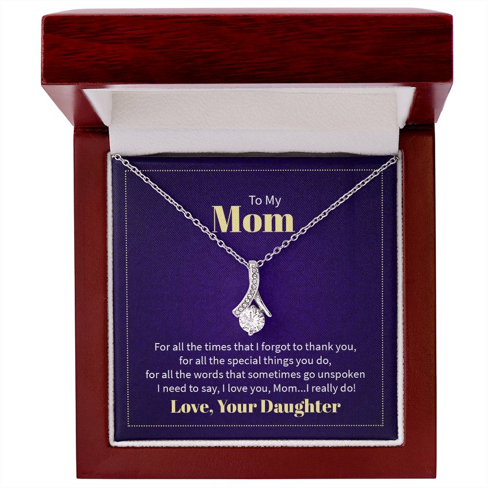 Alluring Beauty necklace features a petite ribbon shaped pendant with message card To Mom white gold finish