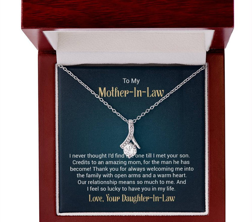 Alluring Beauty necklace features a petite ribbon shaped pendant with message card To My  Mother-In-Law