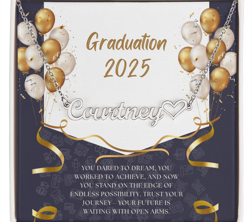Close-up of hands holding an open red gift box featuring a personalized gold name necklace with heart, set against a message card that reads "Graduation 2025" and includes an inspiring graduation quote, with gold and white balloons in the background.