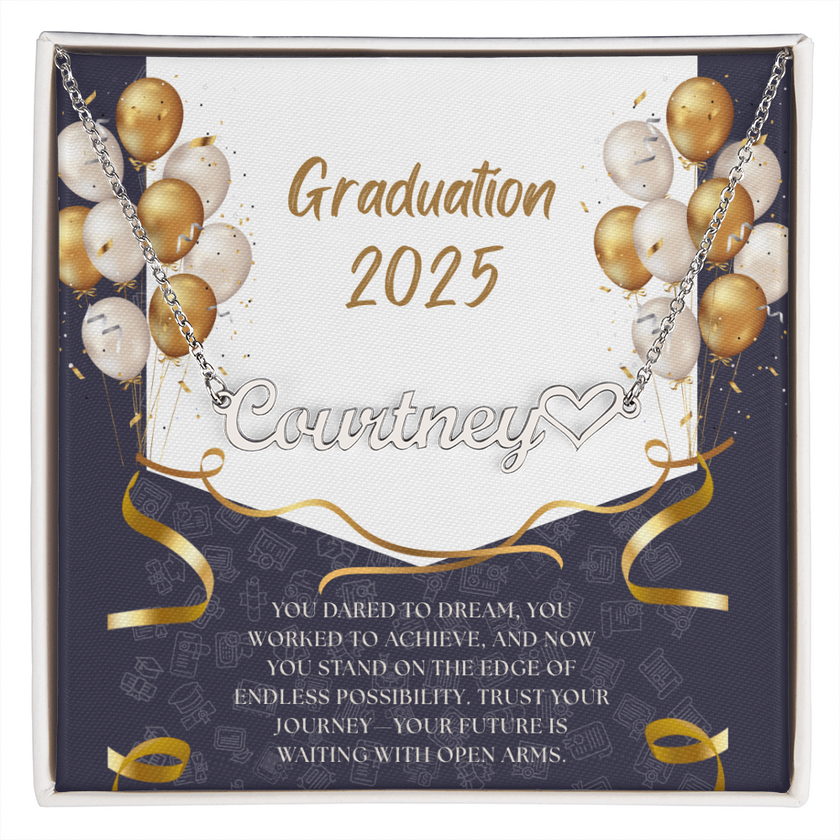 Close-up of hands holding an open red gift box featuring a personalized gold name necklace with heart, set against a message card that reads "Graduation 2025" and includes an inspiring graduation quote, with gold and white balloons in the background.