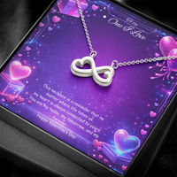 Silver infinity heart necklace displayed in a gift box on a purple Valentine-themed background symbolizing endless love.