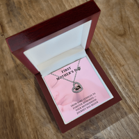 New Mom, New Love – First Mother's Day Heart Necklace with babies feet in center