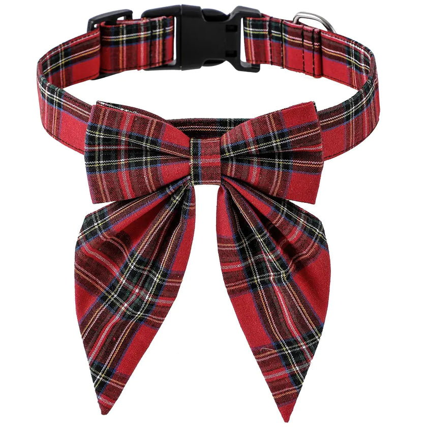 Red plaid dog collar with a large bow on a white background