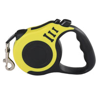 Yellow and black retractable dog leash on a white background