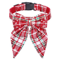 Red plaid dog collar with a matching bow on a white background