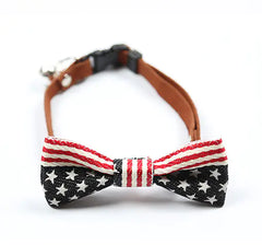 Dog collar with American flag bow tie on a white background