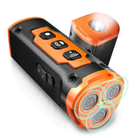 A close-up view of a black handheld ultrasonic dog training device featuring three mesh speaker emitters, control buttons, and an integrated flashlight on top.