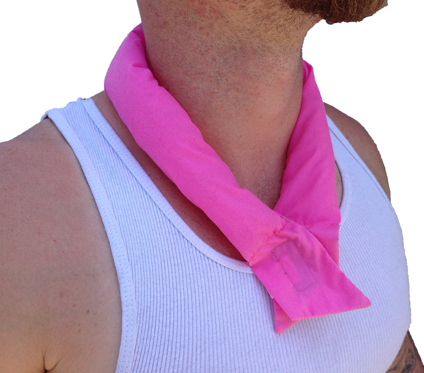 A man wearing a pink cooling neck wrap tied around her neck