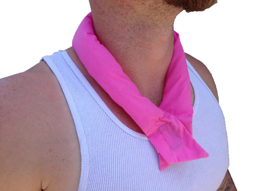 A man wearing a pink cooling neck wrap tied around her neck