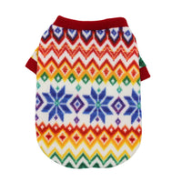 Colorful patterned dog sweater on a white background